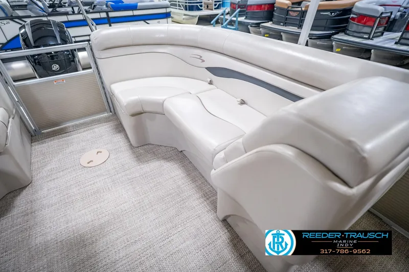 Slide: The Image of Interior of a 2018 Bennington 23 SSRX pontoon boat with beige seating. - 27