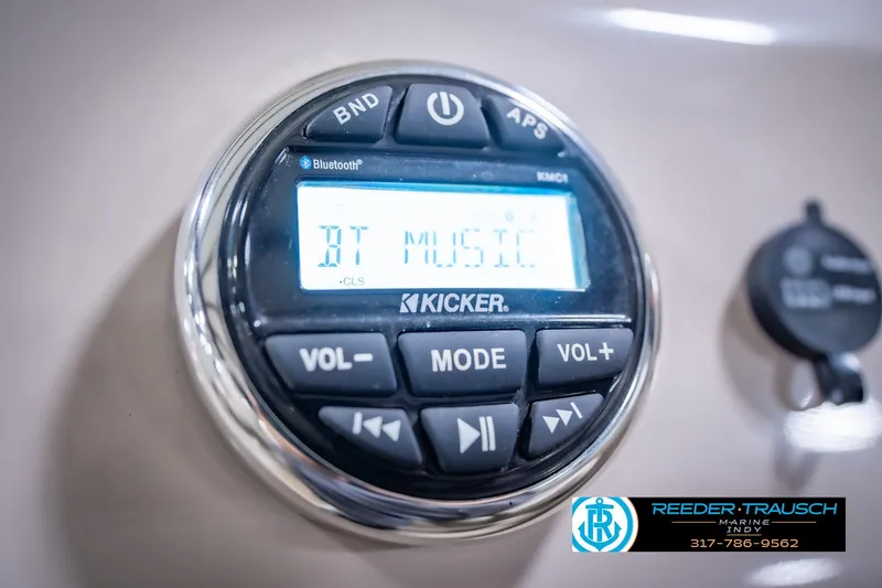 Slide: The Image of Close-up of a Kicker Bluetooth audio system on a 2018 Bennington 23 SSRX boat. - 32