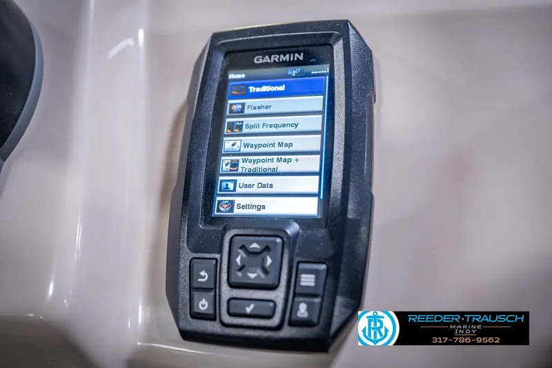 Slide: The Image of Garmin marine device on 2018 Bennington 23 SSRX boat dashboard, displaying navigation options. - 36