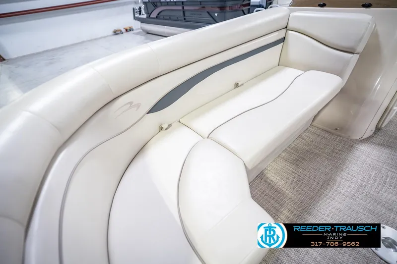 Slide: The Image of Luxurious seating on a 2018 Bennington 23 SSRX pontoon boat, featuring cream upholstery. - 41