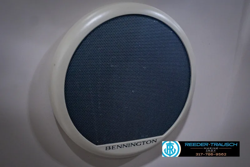 Slide: The Image of Speaker on 2018 Bennington 23 SSRX boat, featuring Reeder-Trausch Marine branding. - 45
