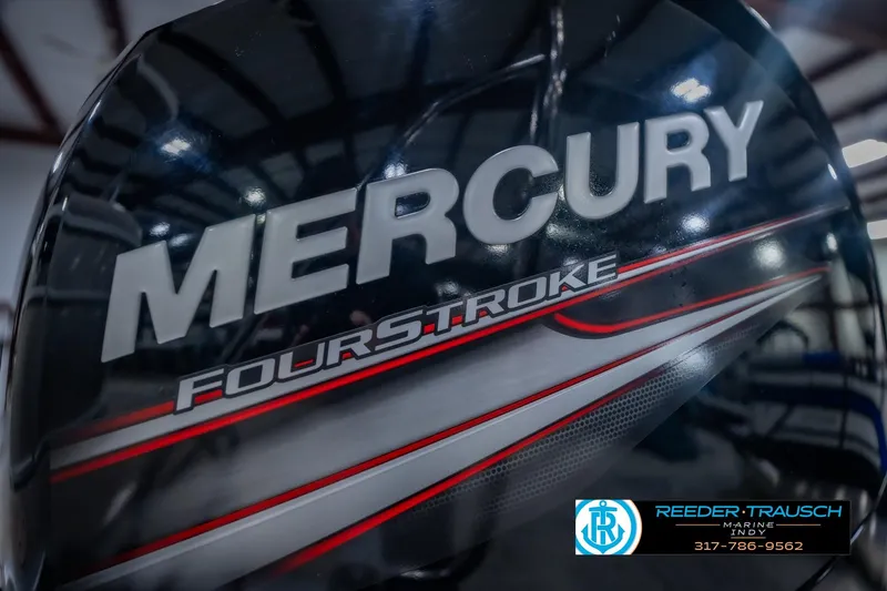 Slide: The Image of Mercury FourStroke engine on 2018 Bennington 23 SSRX boat, Reeder-Trausch Marine logo visible. - 48