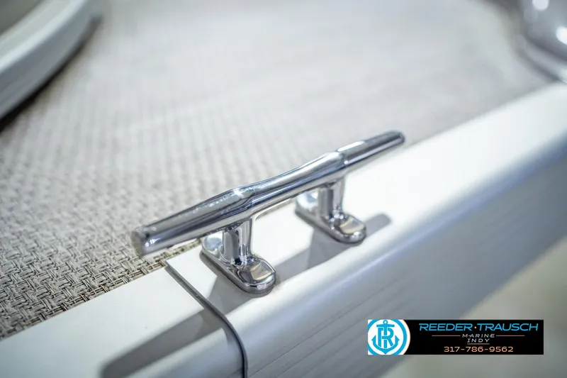 Slide: The Image of Chrome cleat on 2018 Bennington 23 SSRX boat, Reeder-Trausch Marine logo visible. - 55