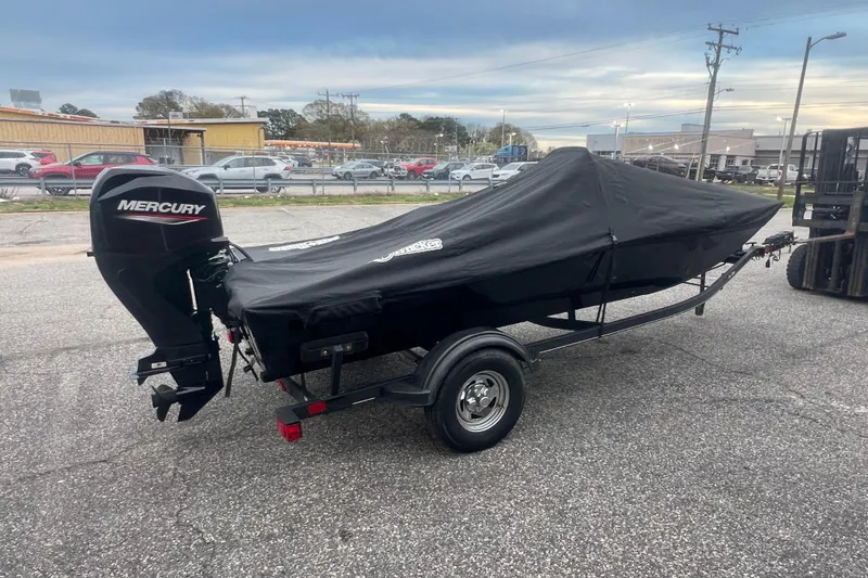 Slide: The Image of 2023 Tracker Bass Tracker Classic XL boat with cover and Mercury outboard motor. - 48