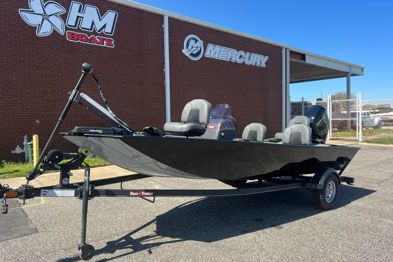 Slide: The Image of 2023 Tracker Bass Tracker Classic XL boat on trailer outside dealership. - 49