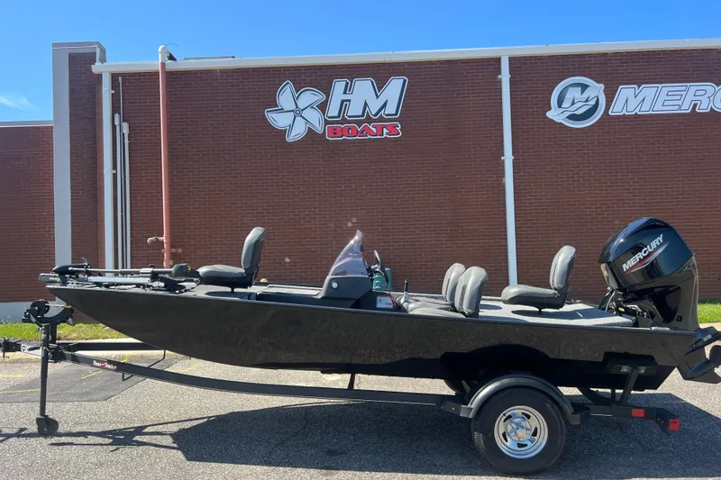 Slide: The Image of 2023 Tracker Bass Tracker Classic XL boat with Mercury engine, parked outside HM Boats building. - 52