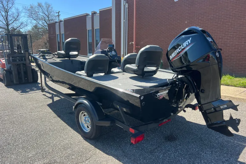 Slide: The Image of 2023 Tracker Bass Tracker Classic XL boat with Mercury engine on trailer. - 54