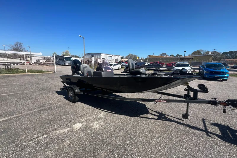 Slide: The Image of 2023 Tracker Bass Tracker Classic XL boat on trailer in parking lot. - 61