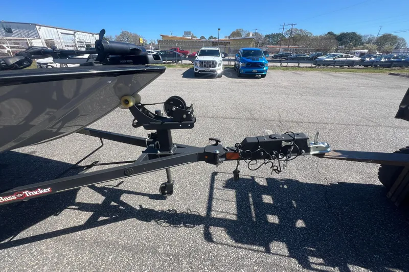 Slide: The Image of 2023 Tracker Bass Tracker Classic XL boat trailer hitch in parking lot. - 63
