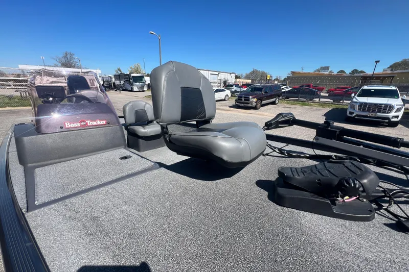Slide: The Image of 2023 Tracker Bass Tracker Classic XL boat with seating and control panel. - 65