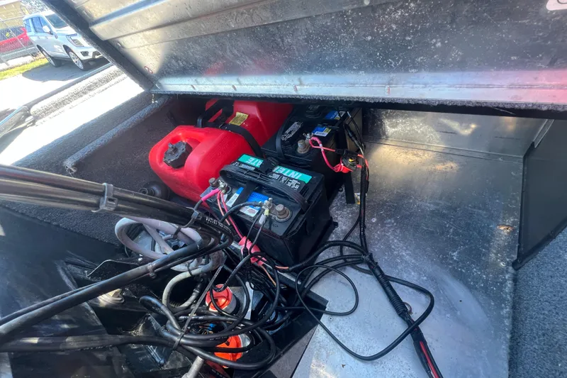 Slide: The Image of 2023 Tracker Bass Tracker Classic XL boat battery and fuel compartment. - 71