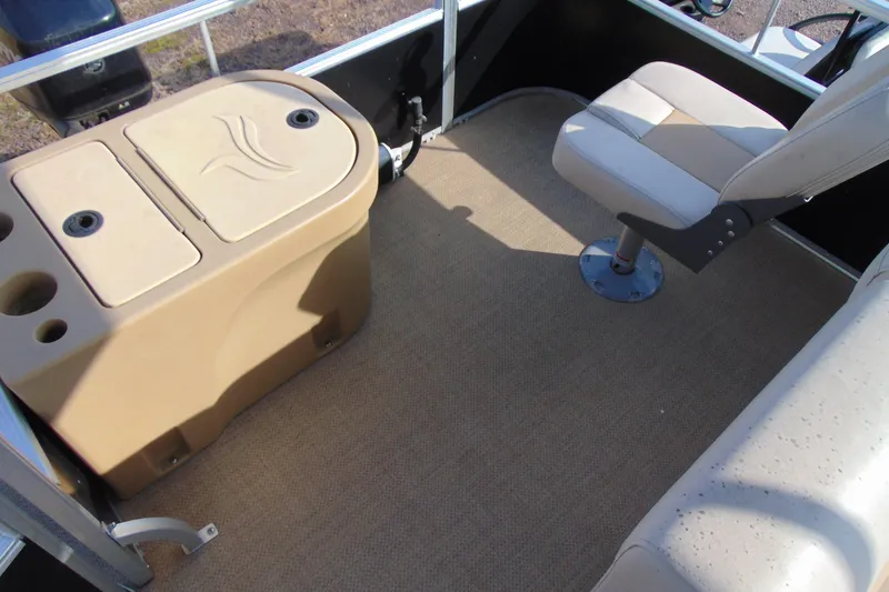 Slide: The Image of 2017 Lexington 317 pontoon interior with seating and storage compartment. - 13