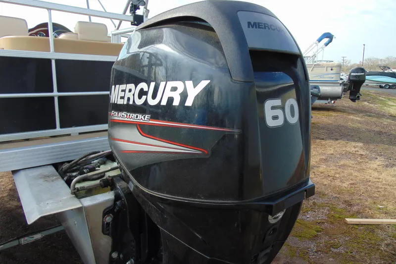Slide: The Image of 2017 Lexington 317 pontoon with Mercury 60 horsepower outboard motor. - 4