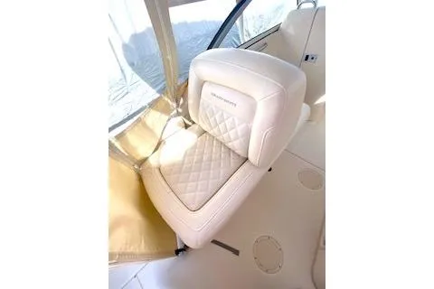 Slide: The Image of 2017 Grady-White Freedom 255 boat interior with luxurious seating. - 11