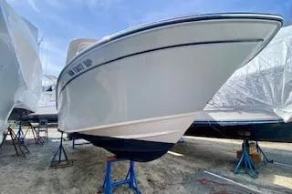 Slide: The Image of 2017 Grady-White Freedom 255 boat on stands, viewed from the front. - 6