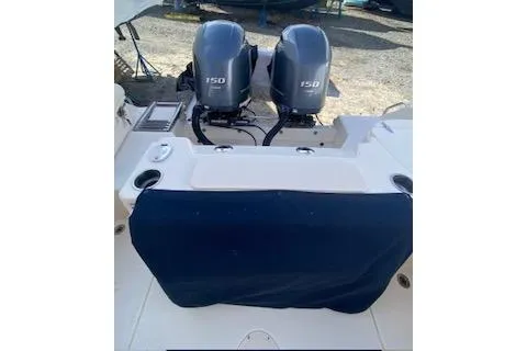 Slide: The Image of 2017 Grady-White Freedom 255 boat with twin 150 horsepower engines. - 7