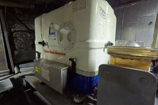 Slide: The Image of Engine room of 1987 Californian 45 Motor Yacht with Westerbeke generator. - 22