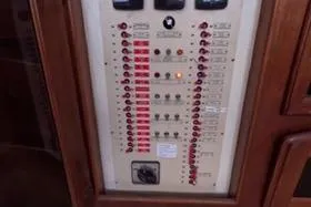 Slide: The Image of Electrical panel of a 1987 Californian 45 Motor Yacht with switches and indicators. - 37