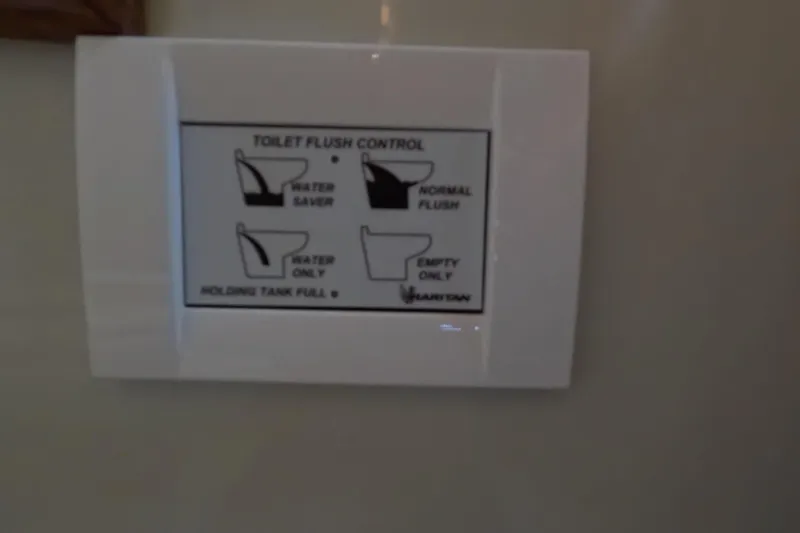 Slide: The Image of Toilet flush control panel on 1987 Californian 45 Motor Yacht. - 53