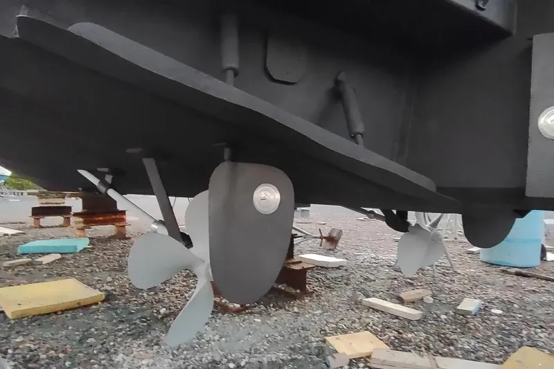 Slide: The Image of 1987 Californian 45 Motor Yacht propellers and rudder on dry dock. - 65