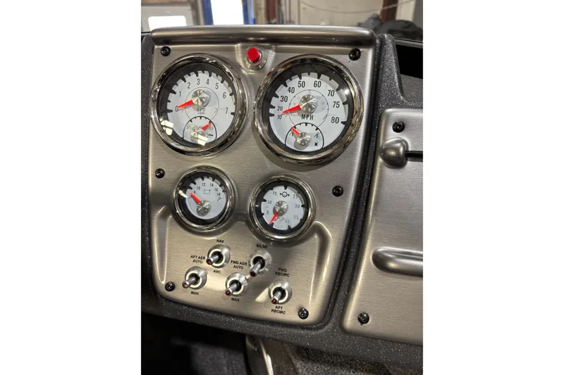 Slide: The Image of Dashboard of 2026 Tracker Pro Guide V-175 Combo with gauges and switches. - 10
