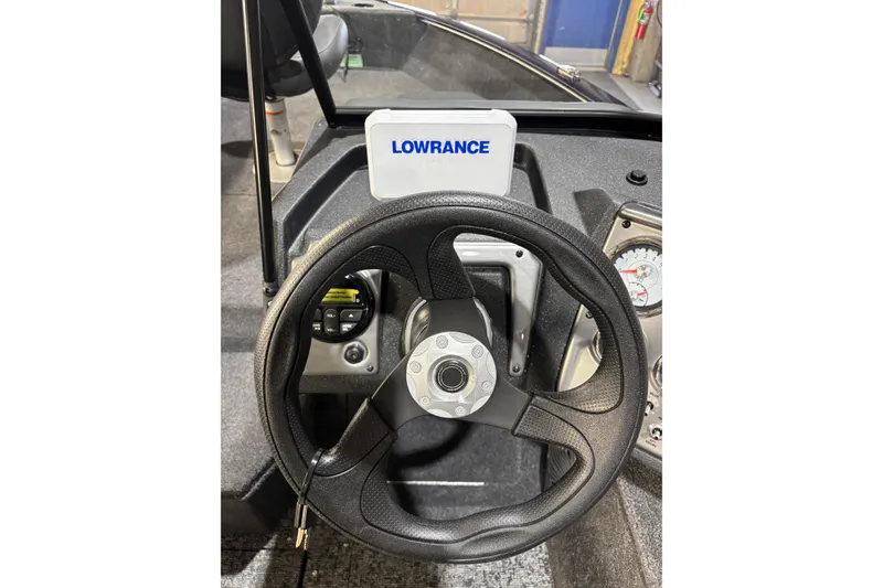 Slide: The Image of Steering wheel of 2026 Tracker Pro Guide V-175 Combo with Lowrance display. - 9