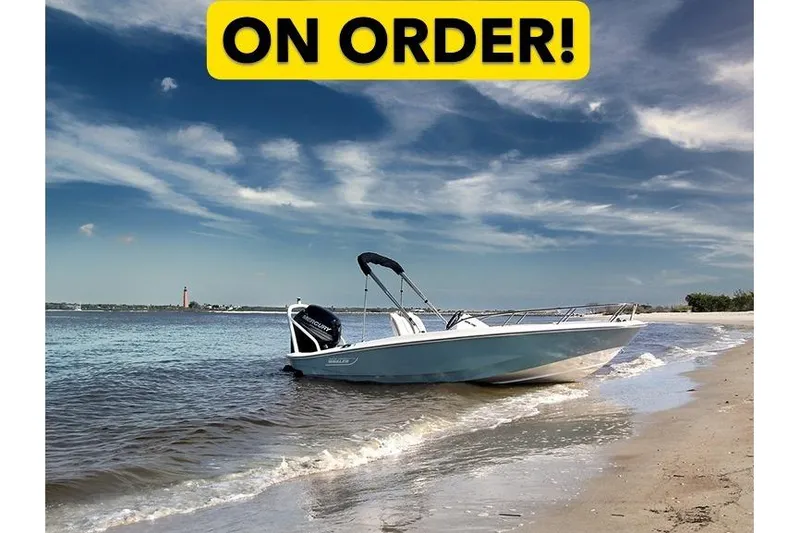 The Image of 2027 Boston Whaler 160 Super Sport boat on sandy beach, "On Order" sign above. - 0