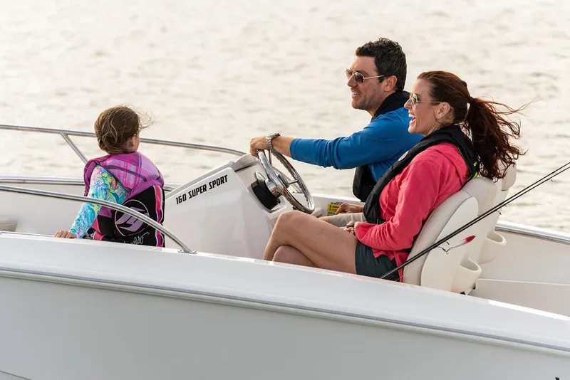 Slide: The Image of Manufacturer Provided Image: Family enjoying a ride on a 2026 Boston Whaler 160 Super Sport boat. - 6