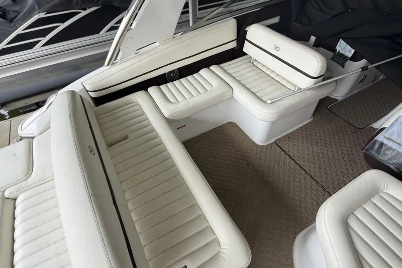 Slide: The Image of Luxurious interior of a 2014 Cobalt R5 boat with white leather seating. - 7