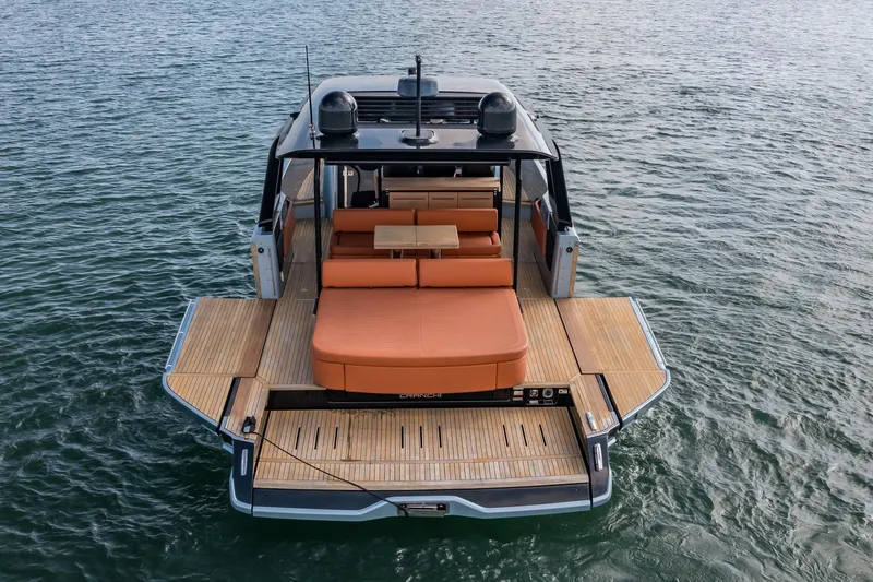 Slide: The Image of 2022 Cranchi A46 Luxury Tender with spacious deck and seating on water. - 10