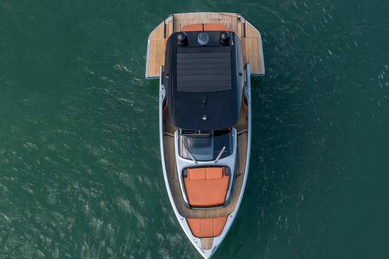 Slide: The Image of Top view of 2022 Cranchi A46 Luxury Tender on calm water. - 12