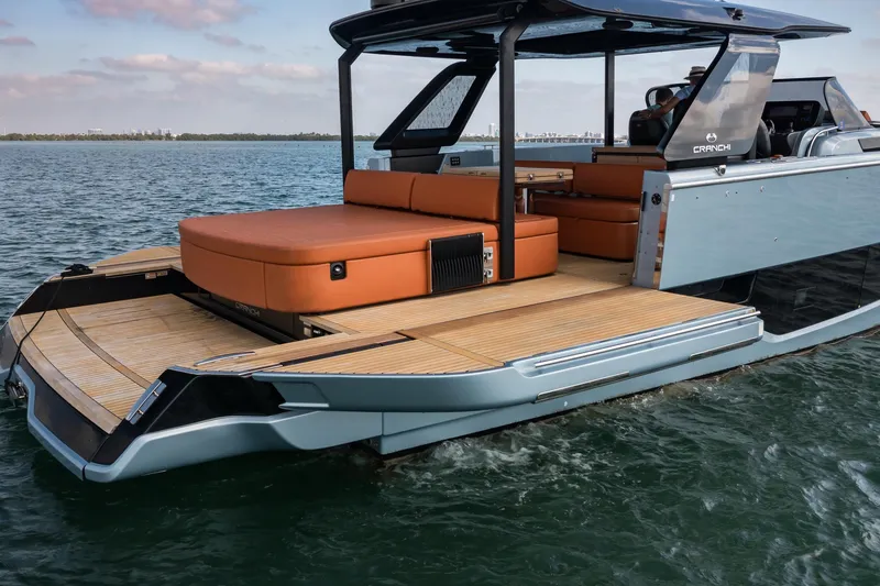 Slide: The Image of 2022 Cranchi A46 Luxury Tender with sleek design and spacious deck on the water. - 13