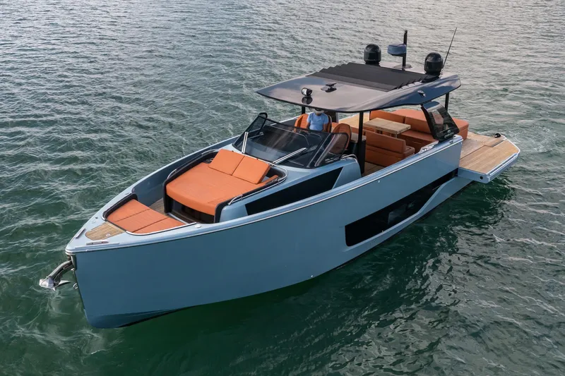 Slide: The Image of 2022 Cranchi A46 Luxury Tender on water, featuring sleek design and spacious deck. - 17