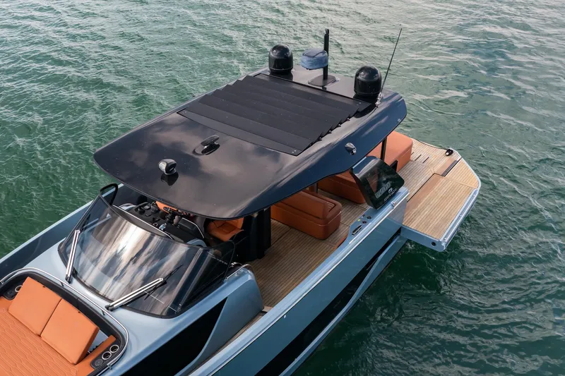 Slide: The Image of 2022 Cranchi A46 Luxury Tender on water, featuring sleek design and spacious deck. - 18