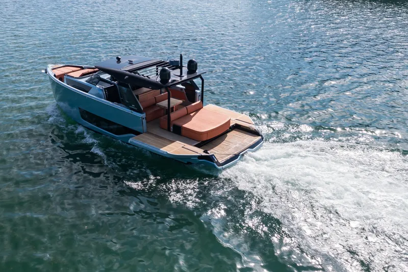 Slide: The Image of 2022 Cranchi A46 Luxury Tender cruising on open water. - 23