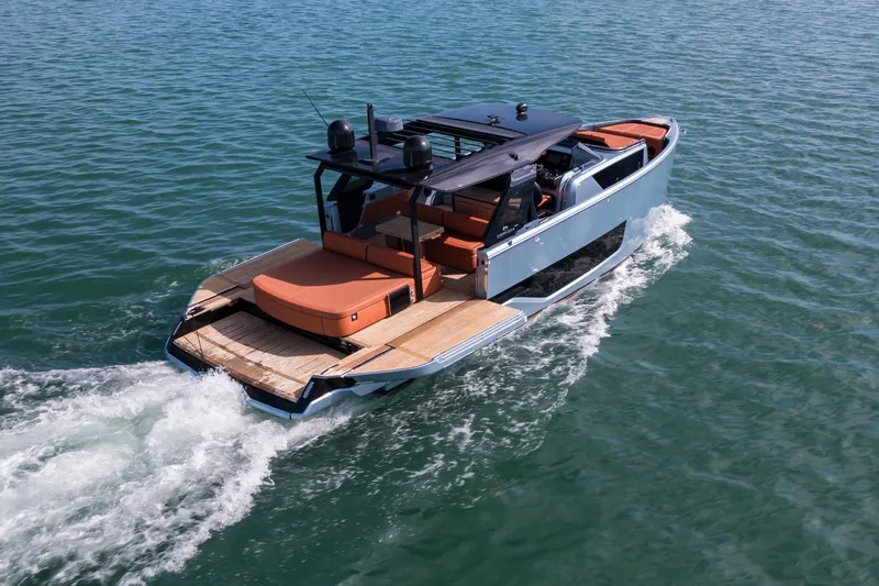 Slide: The Image of 2022 Cranchi A46 Luxury Tender cruising on open water. - 25