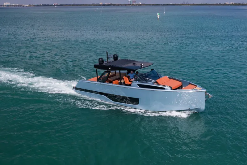 Slide: The Image of 2022 Cranchi A46 Luxury Tender cruising on open water. - 27