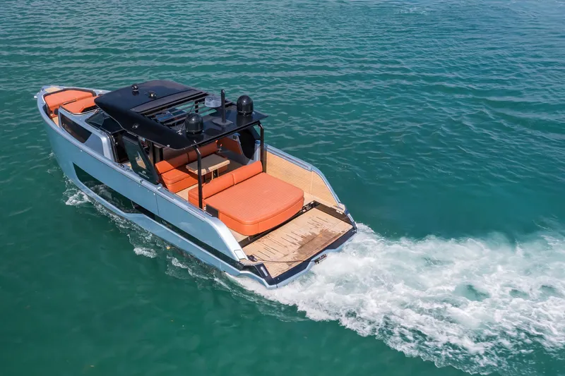 Slide: The Image of 2022 Cranchi A46 Luxury Tender cruising on clear blue water. - 32