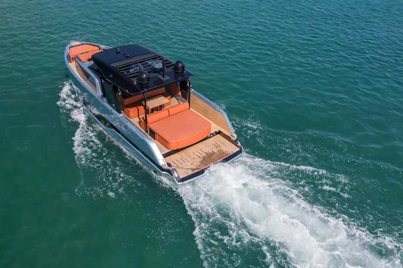 Slide: The Image of 2022 Cranchi A46 Luxury Tender cruising on clear blue water. - 33