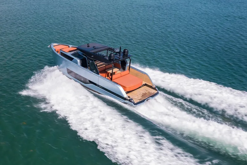 Slide: The Image of 2022 Cranchi A46 Luxury Tender cruising on open water. - 34