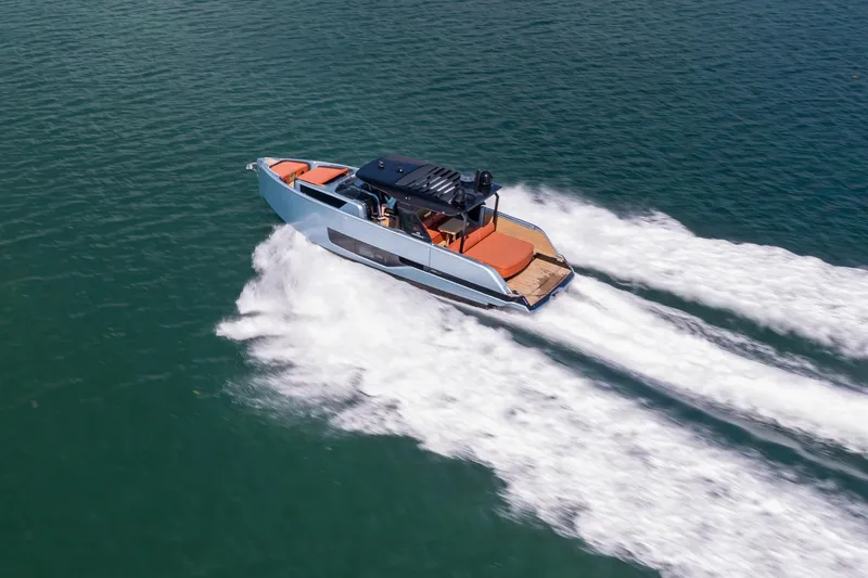 Slide: The Image of 2022 Cranchi A46 Luxury Tender cruising on open water. - 37