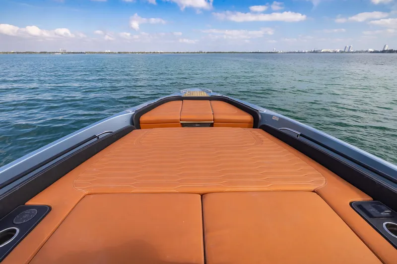 Slide: The Image of 2022 Cranchi A46 Luxury Tender with spacious deck, cruising on calm waters. - 42