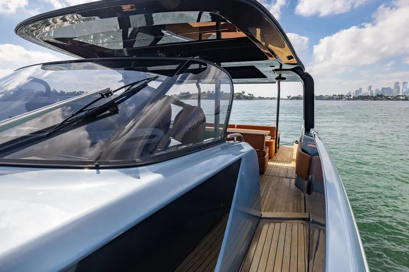 Slide: The Image of 2022 Cranchi A46 Luxury Tender on water, showcasing sleek design and spacious deck. - 44