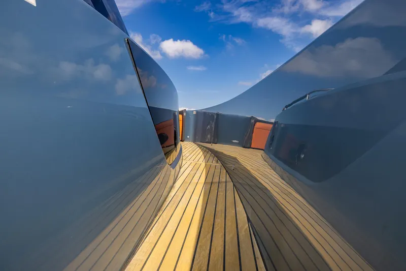 Slide: The Image of 2022 Cranchi A46 Luxury Tender deck with sleek design and blue sky background. - 50