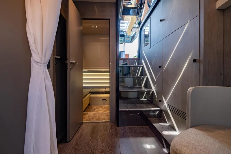 Slide: The Image of Interior of 2022 Cranchi A46 Luxury Tender with modern design and elegant lighting. - 55