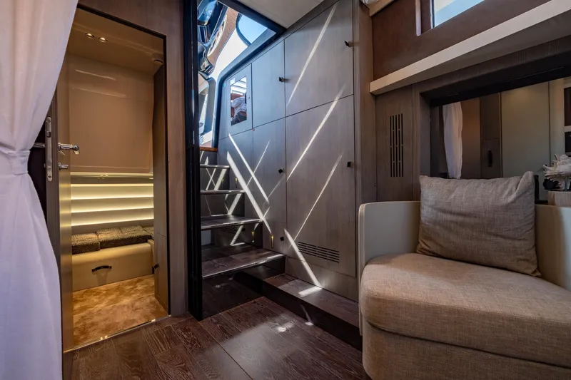 Slide: The Image of Luxurious interior of 2022 Cranchi A46 Luxury Tender with modern design and elegant furnishings. - 56