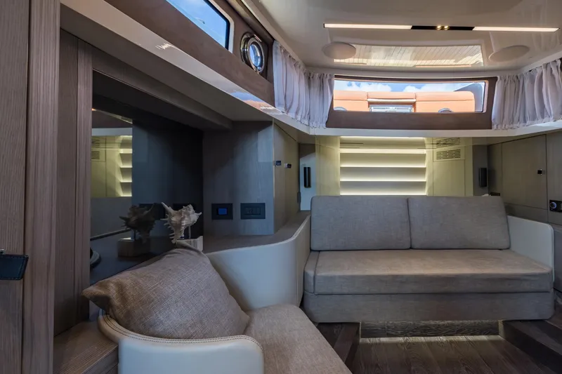 Slide: The Image of Luxurious interior of 2022 Cranchi A46 Luxury Tender with modern seating and elegant design. - 57