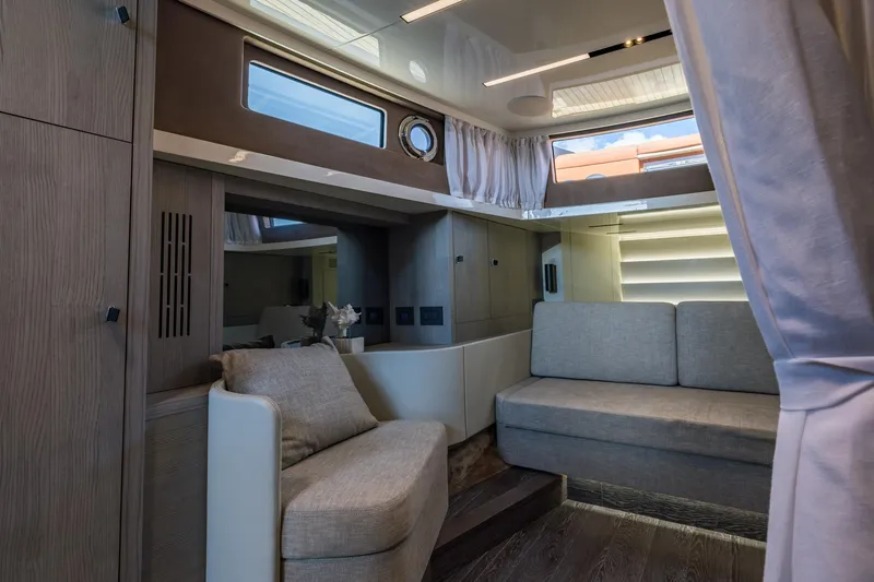 Slide: The Image of Interior of 2022 Cranchi A46 Luxury Tender with modern seating and elegant design. - 58