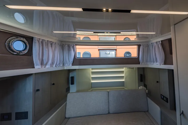 Slide: The Image of Interior of 2022 Cranchi A46 Luxury Tender, featuring modern design and comfortable seating. - 61