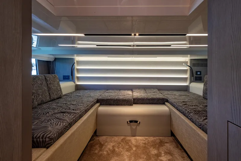 Slide: The Image of Luxurious interior of 2022 Cranchi A46 Luxury Tender with elegant seating and ambient lighting. - 64